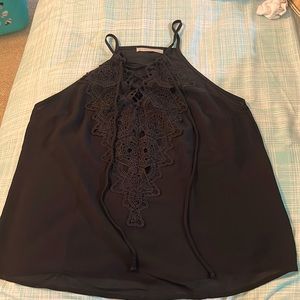 Active USA size medium black tank top with lace detail and lace up front